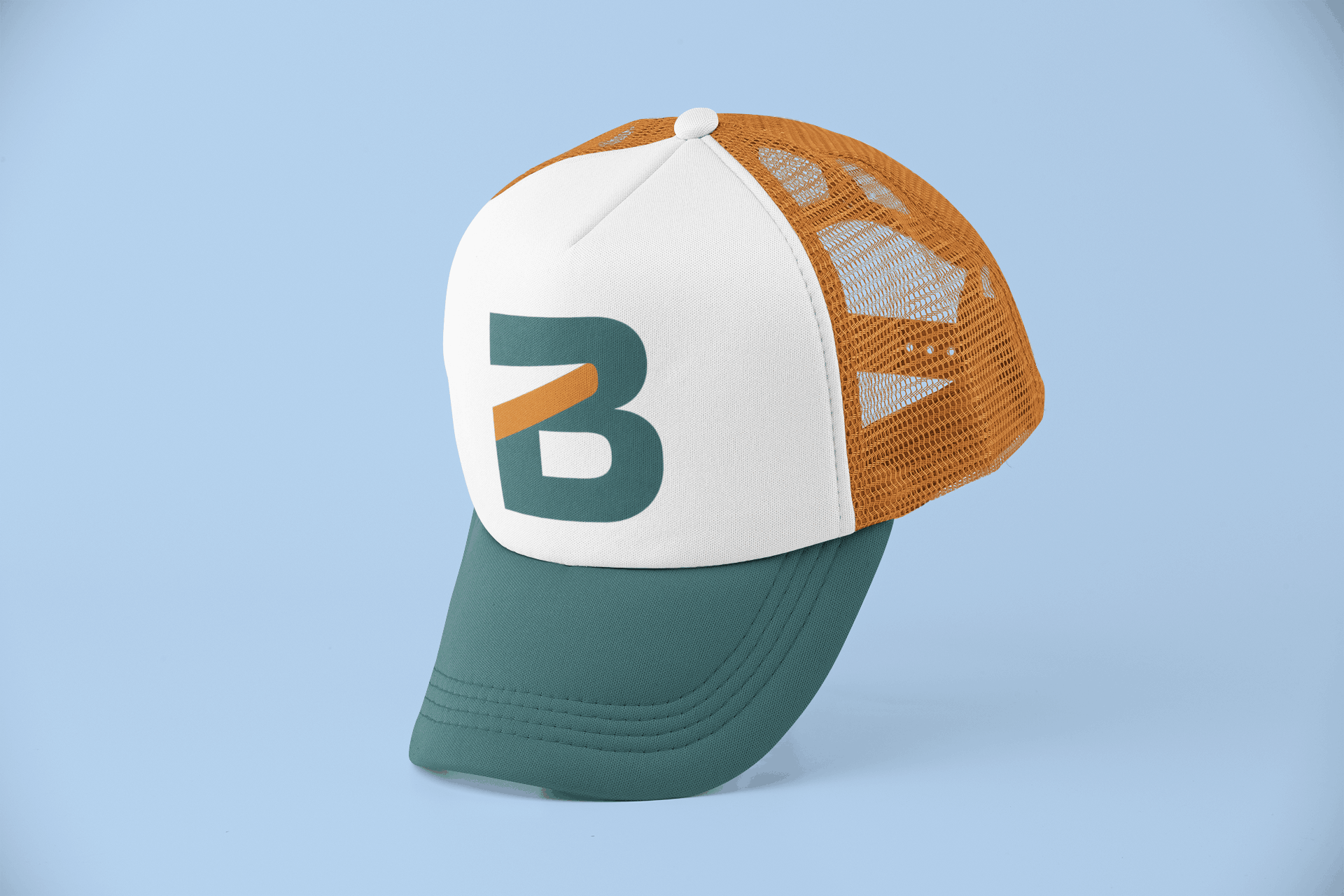 A two-tone trucker hat with a teal brim, white front panel featuring a large Brick City Branding "B" logo, and orange mesh backing.