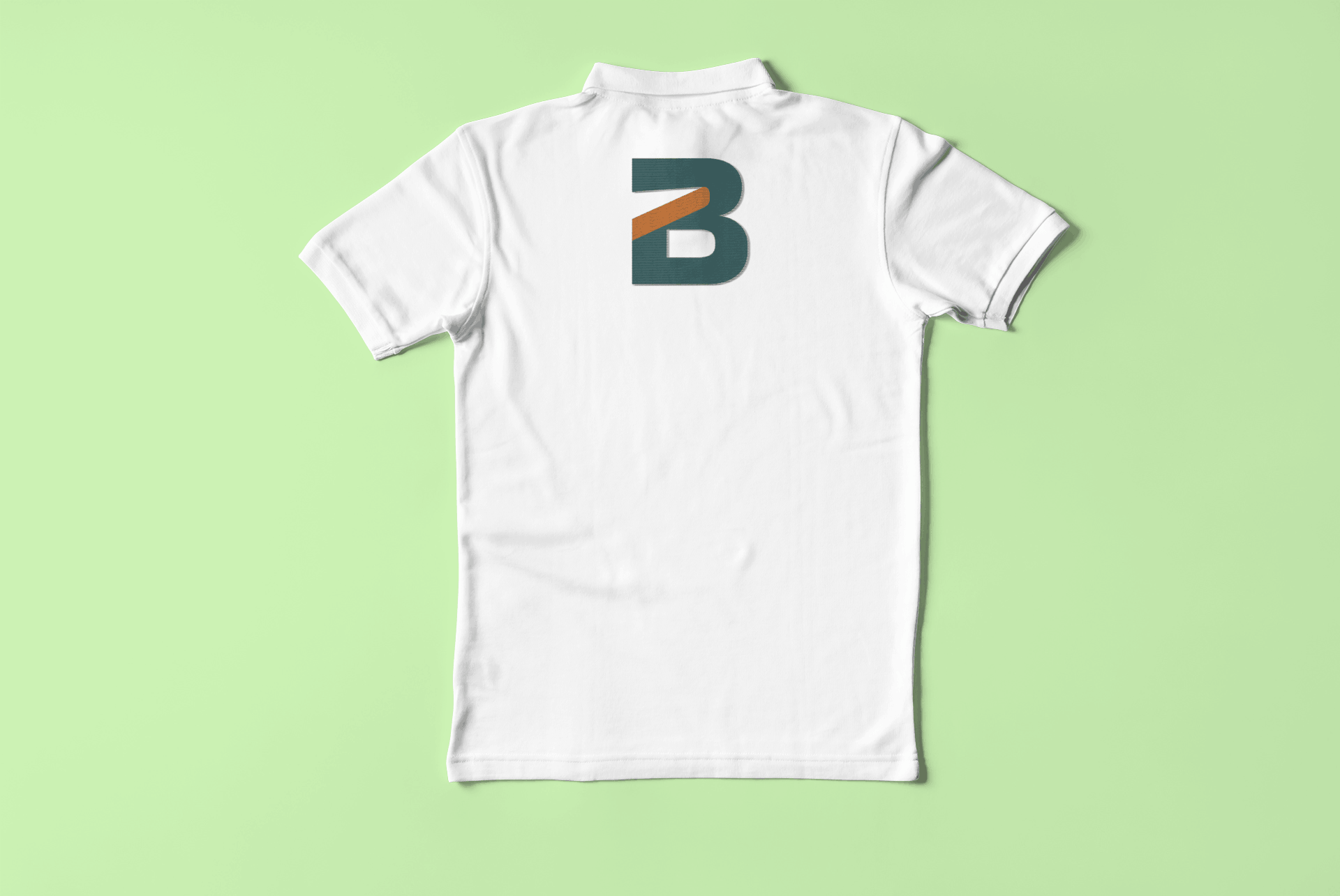 Rear view of a white polo shirt featuring a large teal and orange "B" monogram logo printed on the back neck area, also known as the yoke.