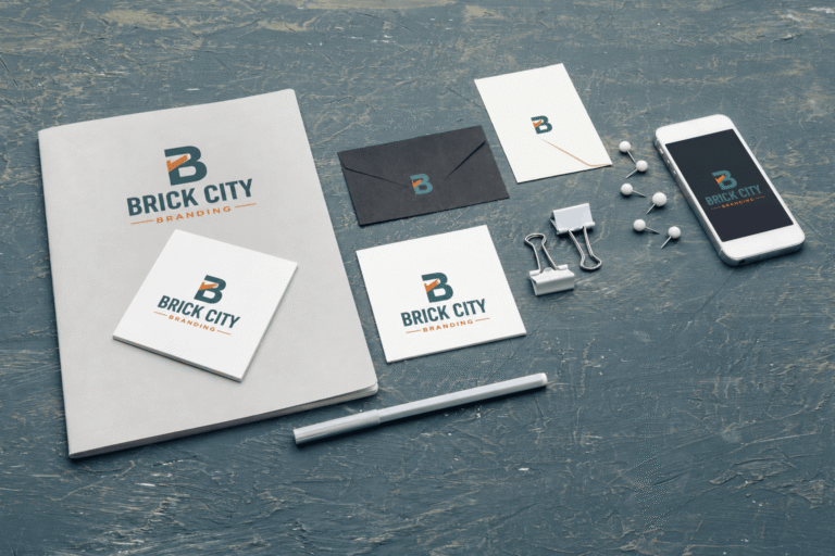 Flat lay of custom corporate branding stationery and single-source branding logo design materials by Brick City Branding in Ocala, FL.